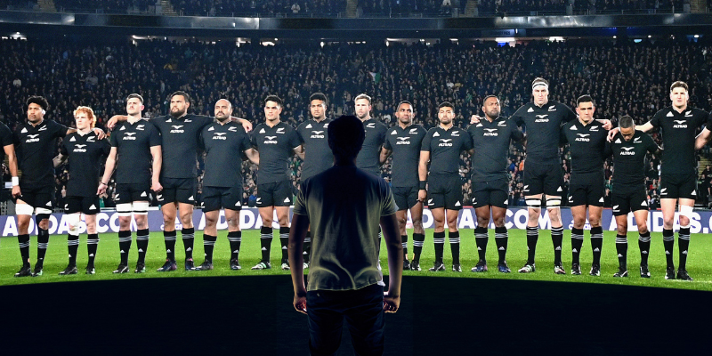 Man standing at All Blacks Experience