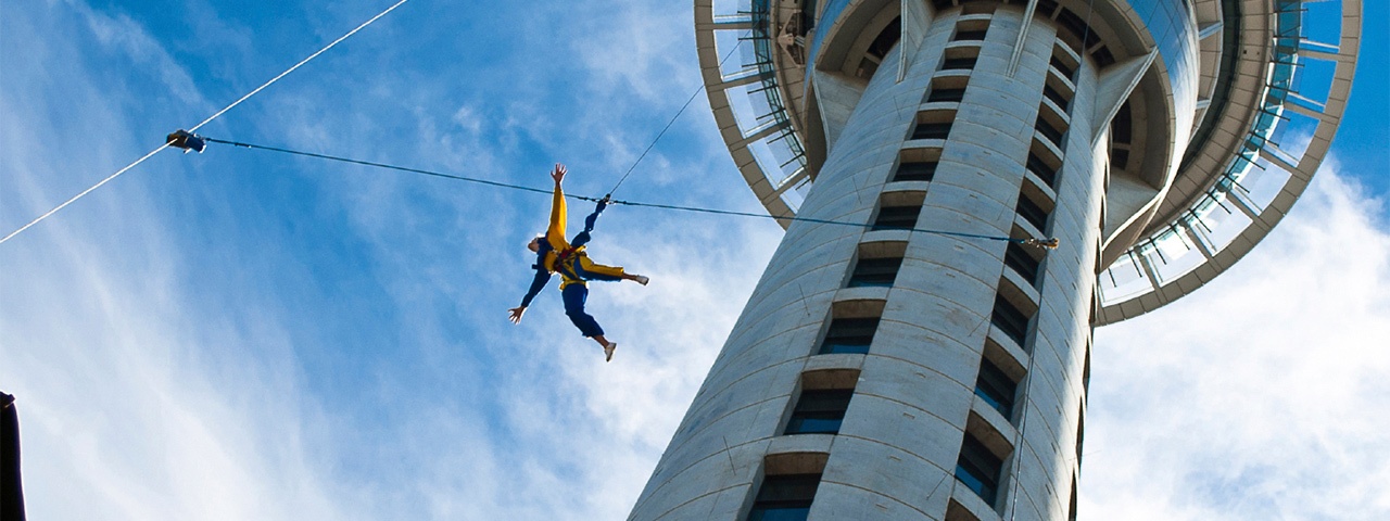 SkyJump - A person makes a controlled descent from the Auckland Sky Tower