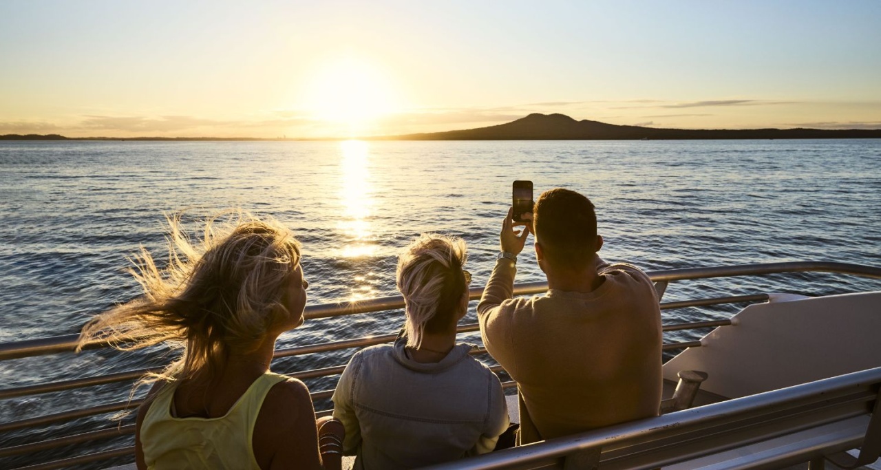 Group enjoying a trip on an Explore boat to Waiheke Island