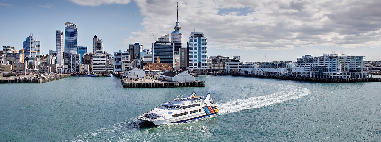 A Fullers Ferry comes out of the Downtown Ferry Terminal on Auckland's waterfront 