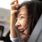 Girl in car window