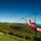 Two people on the EcoZip Adventures zipline