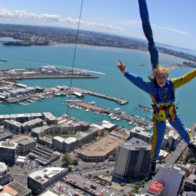 A girl on the Auckland Sky Tower SkyJump