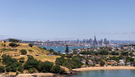 View of hill with Auckland city in the distance