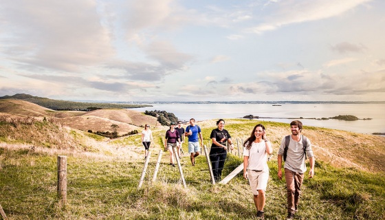 A group of people walking in the countryside